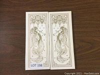 Closed white tri-fold Franklin Mint Christmas calendar with gold embossed angel artwork on front covers.