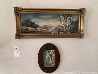 Both framed artworks hung on wall, showing scale and arrangement