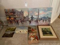 Two large Antoine Blanchard oil paintings leaning against wall with five smaller oils on floor