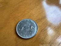 Obverse side showing Canadian coat of arms, year 1968, and denomination.