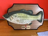 Front view of Big Mouth Billy Bass mounted on wood plaque showing full fish and nameplate.