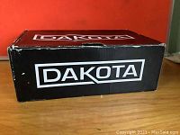 Closed Dakota shoe box with visible brand name on side and top.