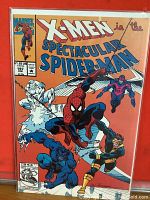 Front cover of X-Men Spectacular Spider-Man comic #197 showing Spider-Man and X-Men characters in action.