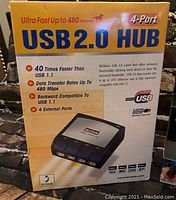 Photo of boxed USB 2.0 hub, showing product specifications and brand Buslink