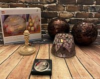 Photo of stairstep candle holder, two mosaic tile balls, and Seagull pewter Blessed Mary medallion in box