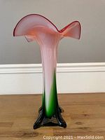 Full view of vase showing fluted rim and body gradient