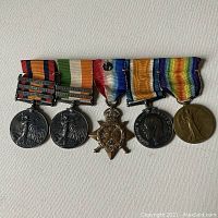 Full group of five medals on original bar
