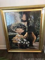 Front view of the large framed painting showing Grecian urns, floral arrangements, and a gold-colored frame.