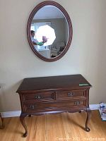 Full frontal view of Gibbard cherry server under mirror