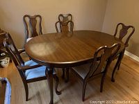 Full set: oval table with six chairs around