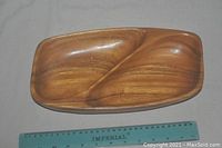 Photo showing full divider serving tray with wood grain and curved divider