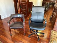 Both chairs side by side on hardwood floor