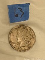 Obverse front of 1924 Peace Dollar coin showing Lady Liberty with the date 1924.