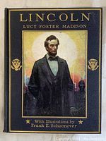 Front cover of the 1928 edition book titled 'Lincoln' with an illustration of Abraham Lincoln and gold embossed text.