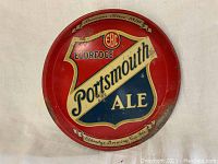 Front side of vintage Eldredge Portsmouth Ale metal beer tray showing logo design and condition