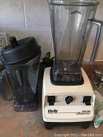 Vita-Mix Super 5000 blender with two blending containers on countertop