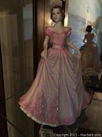 Front view showing full figurine and details of dress and face.