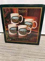 Box of Polo Ralph Lauren Limited Edition gift set containing 4 ceramic mugs, showing front artwork and branding.