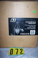 Box showing KI logo, product name Convertible Pendant, and model 91021CH with chrome finish details and dimensions.