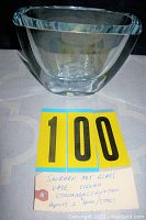 Front view of the clear glass vase showing the etched deer design and square rim shape.