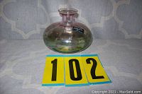 Side/angled view emphasizing the shape and color gradation of the vase, highlighting size compared to measurement cards.