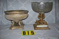 Two vintage centerpieces, one glass on gold marble base and one metal woven design