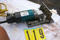 Side view of Virutex biscuit joiner showing motor, base and power cord