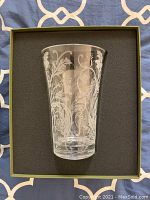 Clear crystal vase with floral etching inside original green Christofle box with custom foam insert.