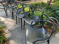 Front view of all six chairs lined up outdoors