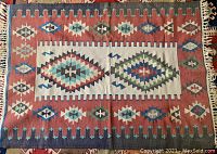Top-down view of rug lying flat showing overall pattern and colors