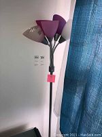 Full view of the 5-bulb adjustable floor lamp showing colored shades and adjustable arms.