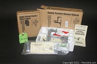 Pampered Chef Apple Peeler Corer Slicer with grey clamp stand, red handle crank, original box, styrofoam insert, manuals, and accessories.