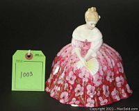 Front view of figurine with lot tag