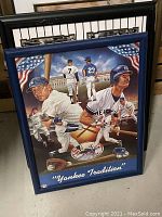 Framed sports artwork titled 'Yankee Tradition' with multiple baseball player images and American flag motifs