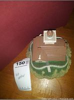 Top view of the Danbury Mint East Brother Station lighthouse resin figurine showing roof and lighthouse tower details.