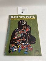 Front cover of program titled 'AFL vs NFL 1968 World Championship Game' on green background with stylized artwork