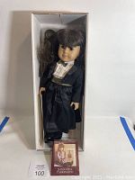 Full view of Samantha Parkington doll in original box, dressed formally.