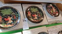 Three Bradford Exchange Firebird Series collectible plates displayed with their original boxes, showing painted scenes of a man interacting with a bird.