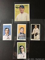 Front view of five vintage tobacco baseball cards mini reprints in sleeves, showing colorful portraits of players including Napoleon 'Larry' Lajoie