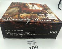 Side view of the puzzle box showing the title, artist's name, puzzle piece count (300), and 'Special Edition' label.