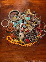 Overhead shot of entire lot on wooden surface