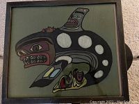 Front view of the framed original whale painting with stylized design and colors