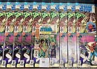 Multiple copies of The New Teen Titans comic books laid out side by side showing front covers with colorful comic art and text.