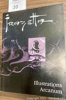Front cover of the Frazetta book titled 'Illustrations Arcanum' showing stylized lettering and fantasy artwork