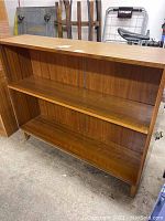 Front view of entire bookcase showing two shelves