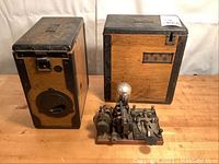Overall view of two wooden cases and telegraph key on table