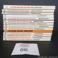 Stack of 14 Doctor Who paperback books with titles and authors visible on spines, arranged horizontally in two images.