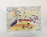 Full view of the framed colorful lithograph showing abstract shapes and markings in blue, yellow, red, orange and black with Picasso signature and date 1.8.57.