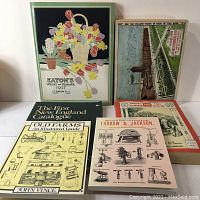 Overall group of vintage trade catalogs including Eaton's 1927, Sears Roebuck, Farrow & Jackson and Old Farms guides.