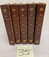Five volumes of John Heneage Jesse books with brown cloth binding and gold embossed text on spine.